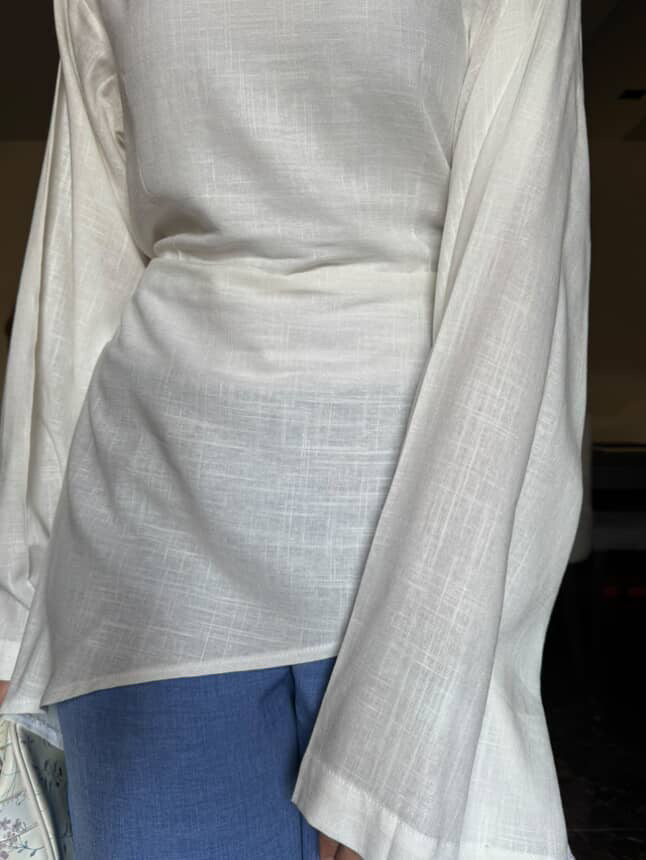 asymmetric white blouse